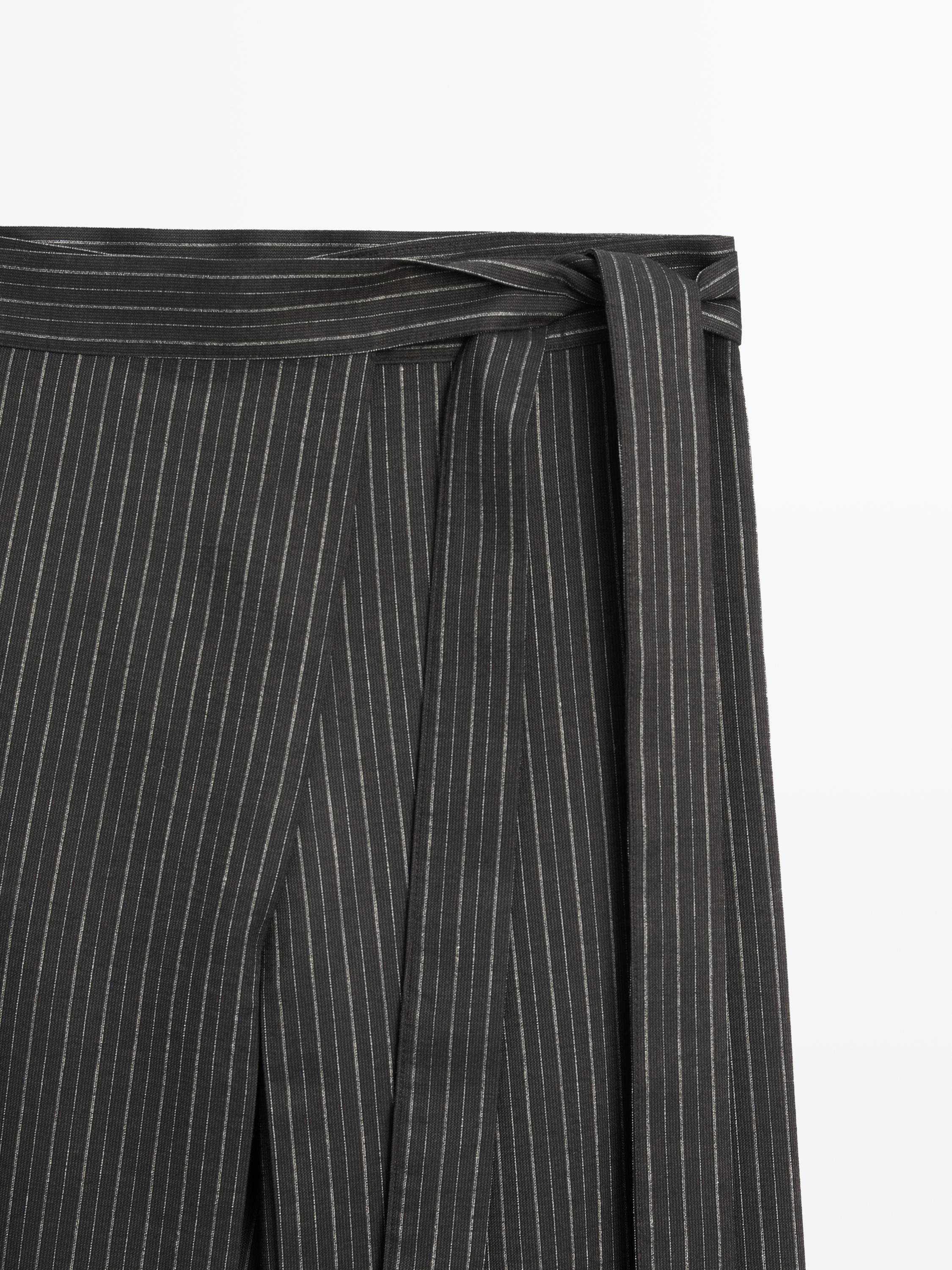 Striped trousers with wrap-style bow detail
